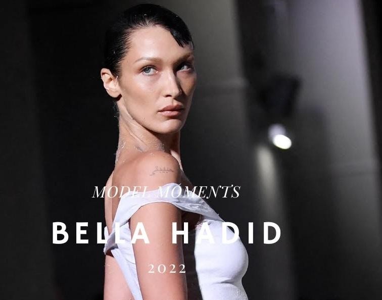 Alt: Bella Hadid na wybiegu podczas New York Fashion Week, prezentująca awangardową stylizację z pewnym krokiem i dynamiczną postawą, symbolizującą jej sukces w karierze modelki.